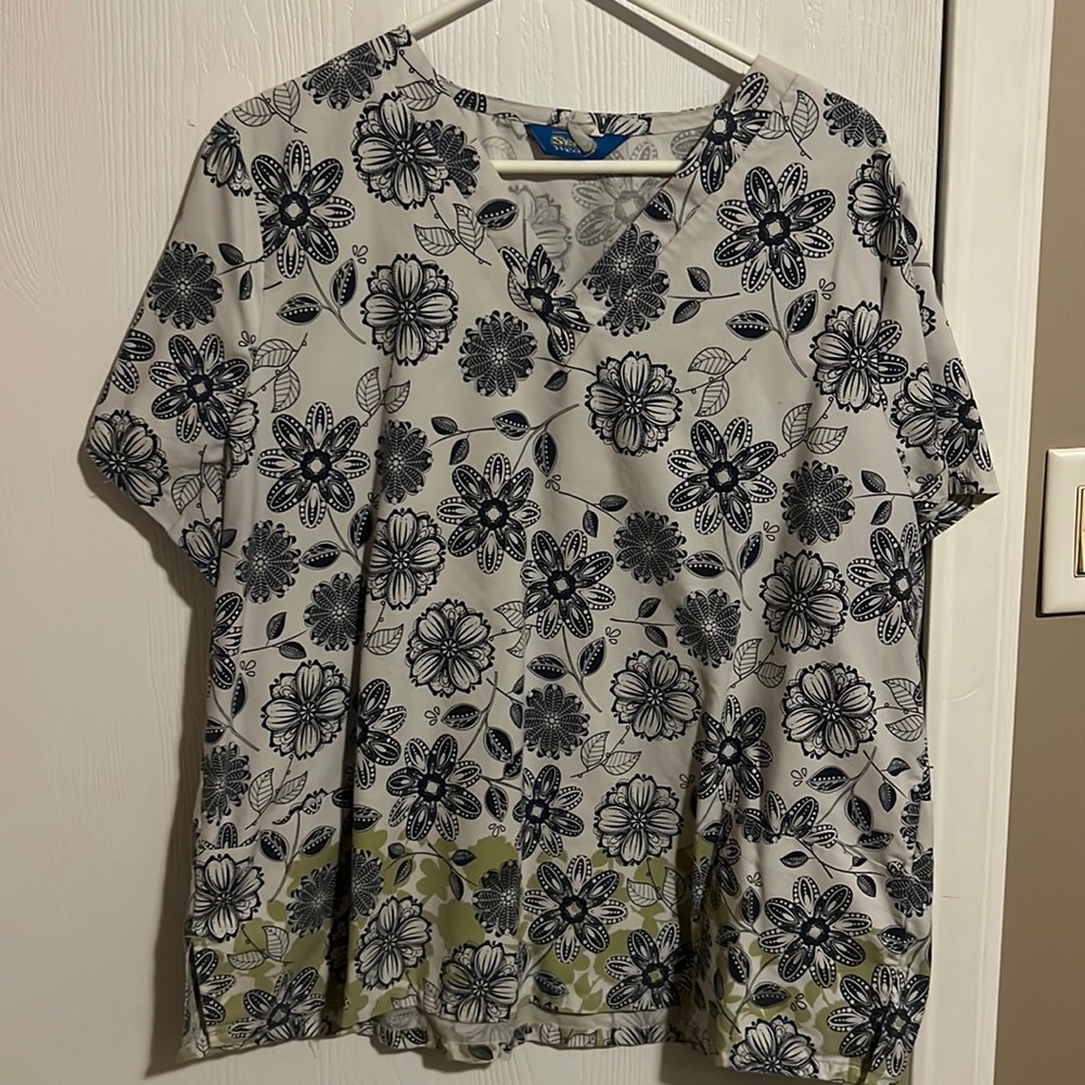 No longer wear scrubs. XL